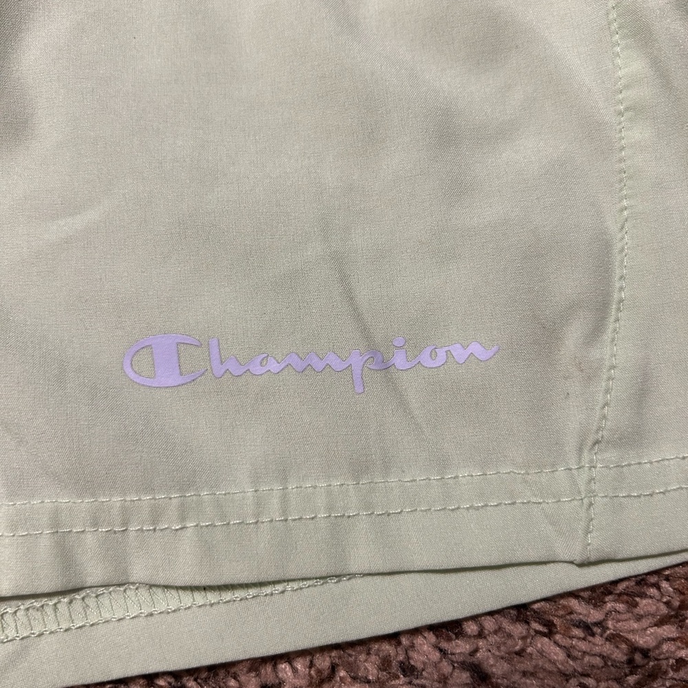 Girls light green champion shorts size large